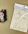 Make Your Own Moth Man Magnet Craft Kit For Kids And Adults with pop-out wood card and assembled Moth Man figure