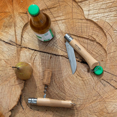 Killer Stainless Steel Folding Pocket Knife With Integrated Wine Corkscrew And Bottle Opener Solid Beechwood Handle on wood.