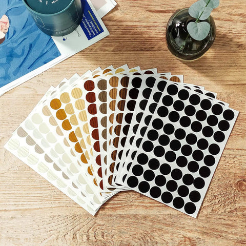 Massive 864 Piece Wood Grain Screw Hole Covers Set 0.83 Inch Waterproof PVC Caps for Furniture Cabinets Desks shown on table