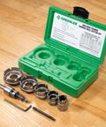 6-Piece Quick Change Carbide-Tipped Hole Cutter Set For 7/8 To 2 Inch Holes, Heavy-Duty Pro-Grade Tool in green case on wood surface