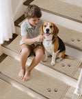 Non Slip Stair Treads For Wooden Steps 28x9 Inches Indoor Carpet Stair Runner Machine Washable Soft Polyester Mats With TPE Backing 15 Pack Beige Kid And Pet Friendly shown on stairs with child and dog.