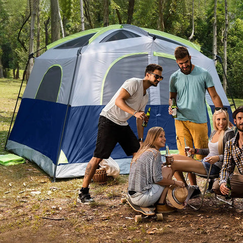 Group enjoying campsite beside Spacious 6 Person Waterproof Family Tent With Windproof Build And Easy Setup In Minutes, Dark Blue