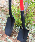 Round Point Digging Shovel With D Handle, 31 Inch Fiberglass Shaft, Pro Grade Comfort Grip Spade in garden setting.
