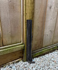 Heavy Duty Fence Post Repair Kit For 4x4 And 6x6 Wood Posts With One Piece Post Brackets installed on wooden fence.