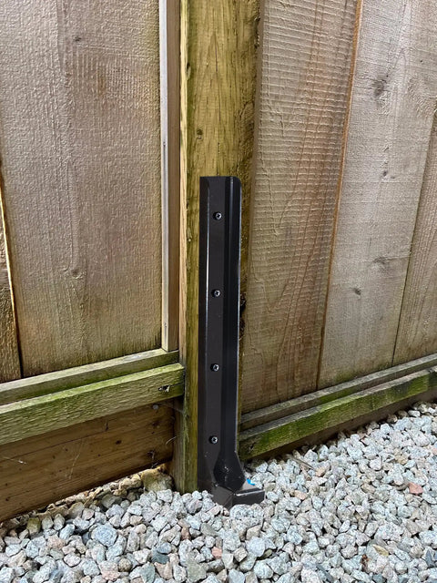 Heavy Duty Fence Post Repair Kit For 4x4 And 6x6 Wood Posts With One Piece Post Brackets installed on wooden fence.