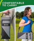 Person carrying Wild Golf Cooler Bag With Two Ice Packs Keeps Drinks Ice Cold For Hours Holds Six Cans, shown on shoulder and by hand.