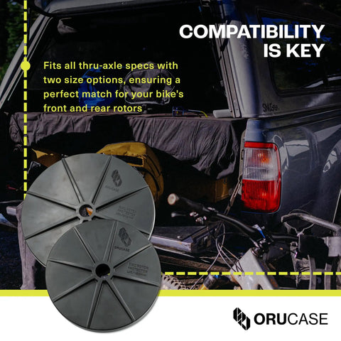Travel Rotor Guard For Mountain Bikes Disc Rotor Protector with text about compatibility near car with open trunk