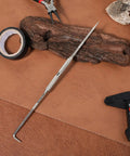Heavy Duty Double Pointed Scriber Tool With Sharp Carbide Tip For Precision Metal Marking and Welding Layouts on workbench.