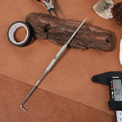 Heavy Duty Double Pointed Scriber Tool With Sharp Carbide Tip For Precision Metal Marking and Welding Layouts on workbench.