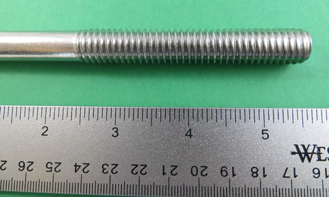 Top Shelf Beefy Stainless Steel 316 Marine Grade Eye Bolt Half Inch By Eight Inch Short Thread with ruler for size reference.