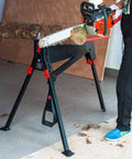 One Ton Clamping Force Portable Material Support Station with Hands Free Holding in use with chainsaw on log