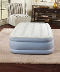 Twin Size Air Mattress With Vertical Beam Construction And Edge Support, external pump, in a living room setting