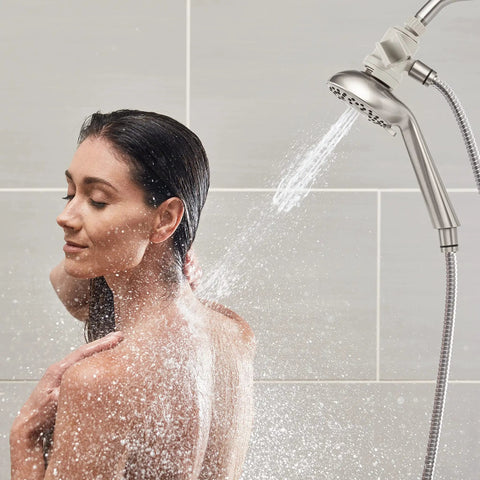 Magnetic Adjustable Height Handheld Shower Head With Dual Dock 5 Foot Metal Hose PowerPulse Massage Brushed Nickel Finish spraying water