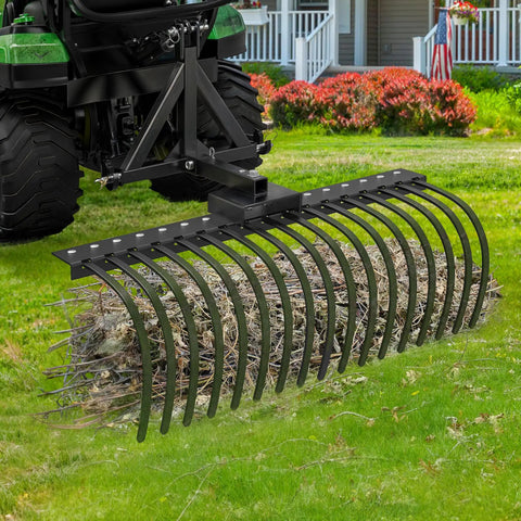 Beast Of A Tow Behind Landscape Rake For ATV And UTV 48 Inch Wide With 2 Inch Receiver 17 Heavy Duty Spring Steel Tines Lawn Dethatcher Attachment For Leaves Debris And Grass Powder Coated Alloy Steel Black shown attached to ATV.
