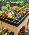 63 By 114 Inch Raised Garden Bed Liner Set With Heavy Duty Cuttable Non Woven Fabric for Large Veg Trough, installed with flowers