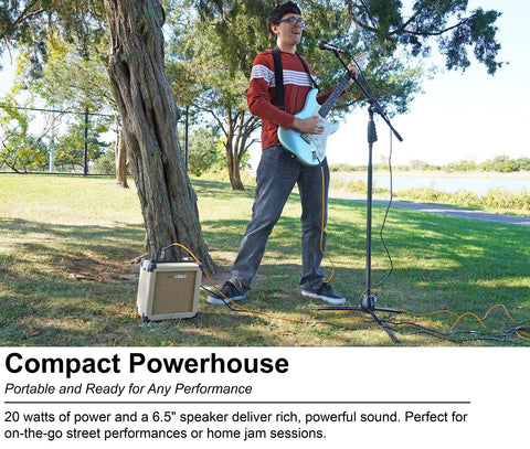 Guitarist using G-Charge 20 Battery Powered Guitar Amplifier with 6.5 inch speaker in an outdoor performance