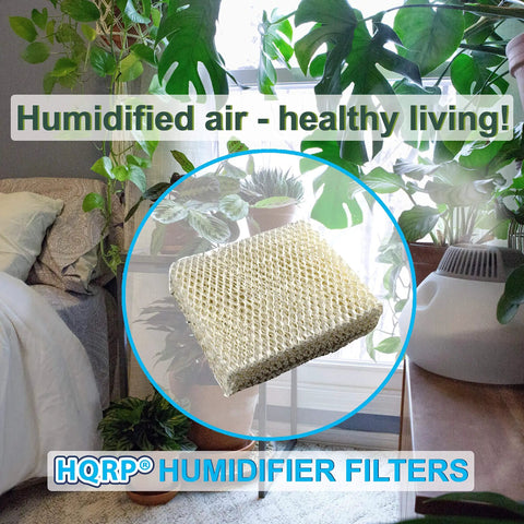 2 Pack Humidifier Wick Filter Replacement For Duracraft And Kenmore Humidifiers showcased in a cozy indoor plant setting.