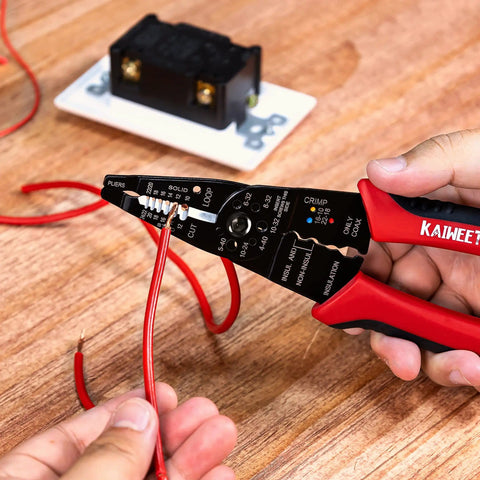 Person using All In One Wire Stripper And Cable Splicer Tool For 10 22 AWG on red wire, showing ergonomic TPR handles and markings.