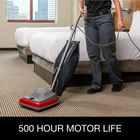 Tradition Upright Commercial Bagged Vacuum Cleaner Workhorse for heavy duty carpet cleaning in hotel room, in use