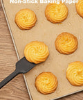 Precut Parchment Paper Sheets 200 Pack Unbleached Nonstick Baking Sheets 16x24 Inches For No Fuss Baking Grilling Air Frying Steaming Cookies Cakes Bread And More unbleached 16x24 inch parchment paper with freshly baked cookies on a tray.