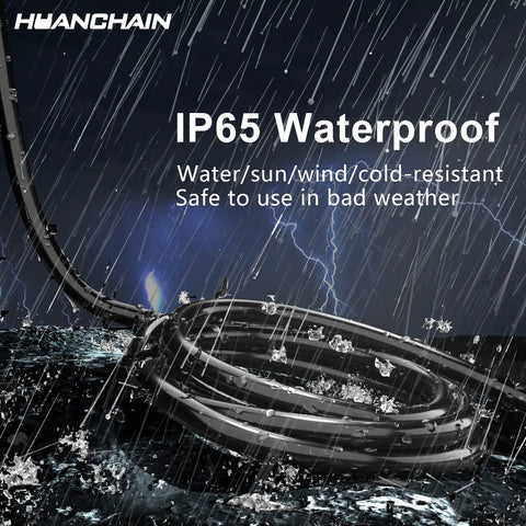 Outdoor Extension Cord 75 Ft Waterproof SJTW 16 AWG 3-Conductor Black coiled in rain showcasing weatherproof design