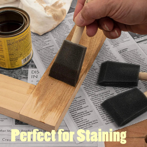 Top Shelf Two Inch Foam Brushes Twenty Four Pack For Painting Staining Varnishing Woodworking Cut Ins Made In The Usa in use on wood.