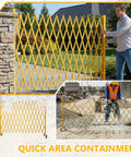 Heavy Duty Rolling Scissor Barrier Expandable Steel Gate With Smooth Swivel Casters For Fast Job Site Lockdown Crowd Control And Tight Safety Perimeter Setup in use outdoors.