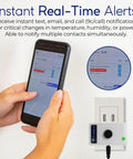 Person holding phone displaying app near Smart WiFi Temperature And Humidity Sensor With Built In Buzzer And Email Text Alerts