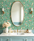 Hassle Free Peel And Stick Wallpaper Featuring Vintage Botanical Bird Graphics And Teal Green Pomegranate Vibes For Smooth Cabinet Wraps And Prepasted Removable Vinyl Rolls on bathroom wall with oval mirror.