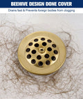 Hassle Free Tub Drain Linkage Assembly With Trip Lever And Gold Cover Adjustable Fit For Bathtub Overflow Repair. Gold drain cover with hair.