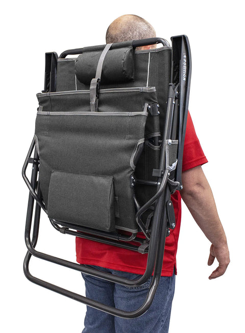Man carrying folded Legz Up Folding Outdoor Lounger with Adjustable Recline and Leg Elevation for patio, beach, or camp use