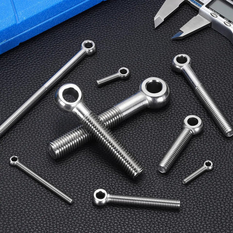 Heavy Duty Swivel Lifting Eye Bolts, Built Tough M6 X 25mm 304 Stainless Steel Rigging Hardware, assorted sizes laid out on black surface.