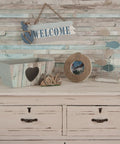 Beach Wood Self Adhesive Film 17 Inch By 78 Inch Roll 2 Pack used on wall behind dresser with nautical decor.