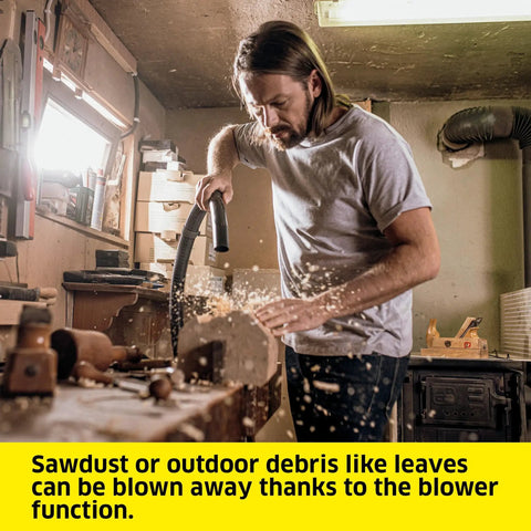 Man using WD 5 P Shop Vacuum 6.6 Gal Wet Dry Vacuum Cleaner with blower function in workshop for wood debris cleanup