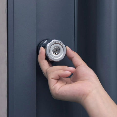 Hand operating Twist To Lock Keyless Storefront Door Lock With Anti Mislock Button And Inaccessible Bypass Redesign For A Secure Shop Entrance Mortise Lock With Hook Deadbolt And Cylinder Combo 1 1/8 Inch on metal door.