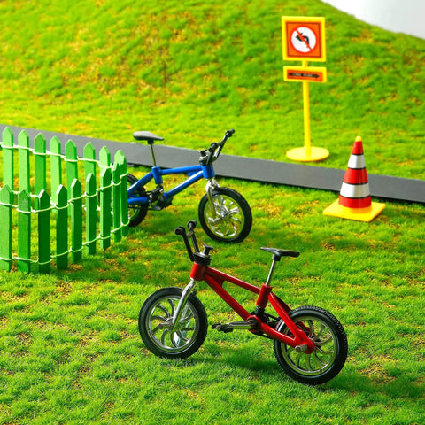 12 Pack Mini Finger BMX Bikes For Kids And Adults in a park setting with red and blue vintage color mix, reconfigurable design