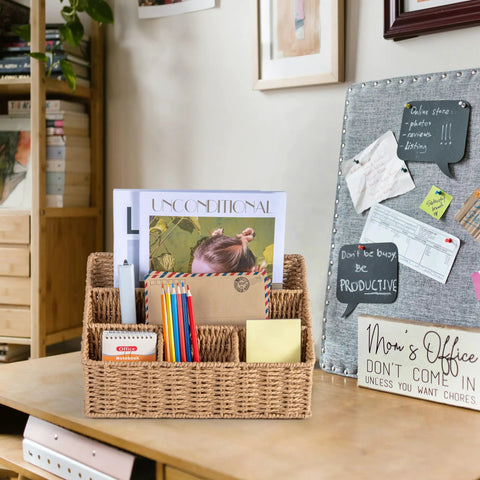 Rattan Desk Organizer With Five Slots Mail Holder And Caddy on wood desk, magazines and pens organized in a wicker basket.
