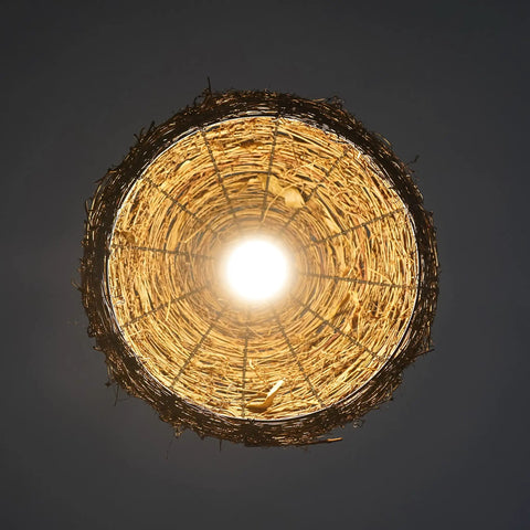 Bottom view of Cozy Vibe Rattan Pendant Light Fixture With Beach Wicker Dome Shade, glowing light in natural brown.