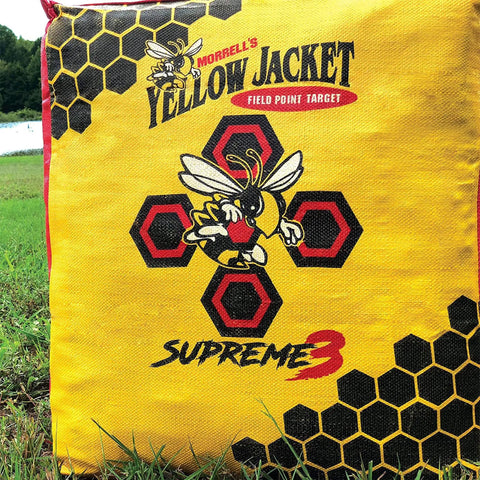 Yellow Jacket Supreme 3 Archery Target Bag with graphic design on a grassy area