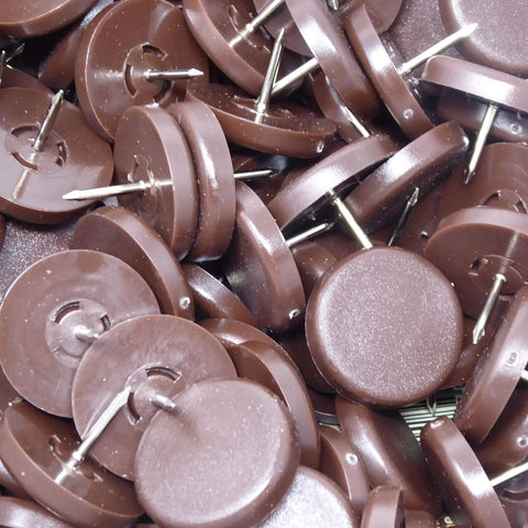 Hella Durable Plastic Furniture Sliders With Nails For Hardwood Floors Round Brown Anti Scratch Glide No Sweat Setup Pack Of One Hundred Solid Long Lasting Quality on wood surface.