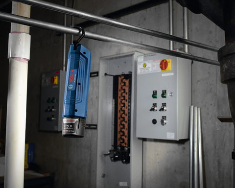 12V Max LED Work Light Bare Tool for Cordless Jobs hanging in workshop, illuminating electrical panels, Model GLI12V-300N