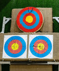 Traditional 3-Layer Straw Archery Target Hand Made For Outdoor Practice, 20 Inch Solid Core with colored rings on stand.