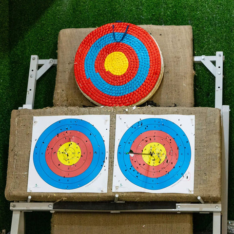 Traditional 3-Layer Straw Archery Target Hand Made For Outdoor Practice, 20 Inch Solid Core with colored rings on stand.