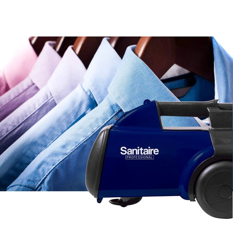 Lightweight Canister Vacuum Cleaner For Smooth Carpet Sweep With 800 Watt Engine And Four Flexible Hose Tools next to neatly hung shirts.