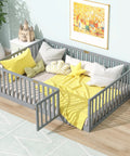 Full Size Floor Bed With High Safety Guardrail And Door For Toddler Transition, rubber wood frame in grey, yellow bedding, small room
