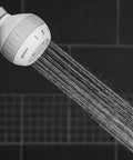 Massage Shower Head With Six Modes And Easy DIY Installation, 1.8 GPM White, Model SM 621E, spraying water in action