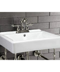 Heritage 4 Inch Centerset Lavatory Faucet With Metal Lever Handle In Polished Nickel on white ceramic sink