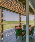 Outdoor deck with wood post frame and pergola, showcasing design use for Beefy 6x6 Post Base Set Of 5 Stainless Steel Post Anchors.
