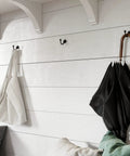 Solid As A Rock Cast Iron Twist Wall Hook Heavy Duty Single Arm Screw Mount With Matching Screws for hanging bags and umbrellas.