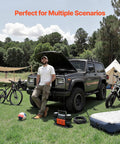 Heavy Duty Dual Cylinder Air Compressor Packed With 10.6 Cfm Quick Fill And Auto Shutoff on grass with a SUV, bicycle, and volleyball.